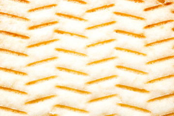 Obraz premium texture of the inverted side of the strip cookie