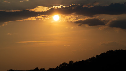 Sunset behind Clouds