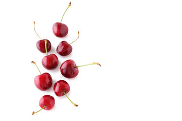 Naklejka na ściany i meble Fresh sweet cherries isolated on a white
