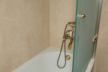 Modern bathroom with a glass partition