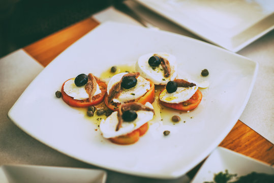 Mozzarella with tomato at restaurant