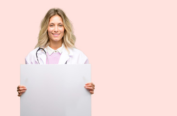 Young doctor woman, medical professional holding blank advertising banner, good poster for ad, offer or announcement, big paper billboard
