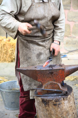 the blacksmith working