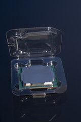 Obraz na płótnie Canvas Central processing unit CPU processor microchip in the packaging box