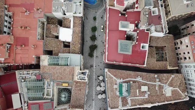 Spain, Valencia aerial shooting, bird-eye view on red roofs, roads and squares