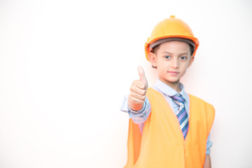 Young boy engineer isolated in white. Handsome early teenage boy portrait with engineering cloth. Confident look pose.
