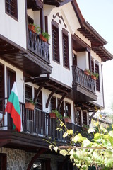 Traditional bulgarian house with flag