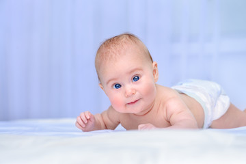 child lying on abdomen