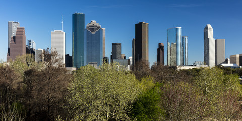 Fototapeta na wymiar MARCH 7, 2018 , HOUSTON, TEXAS - High rise buildings in Houston cityscape illuminated at sunset, Texas, United States, Texas, United States