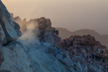 People walking in sulfur emanations on the summit of Pico del Teide, Tenerife