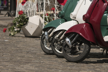 Naklejka na ściany i meble three mopeds painted in colors of the Italian flag