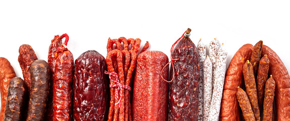 Panorama of traditional spicy dried sausages - obrazy, fototapety, plakaty