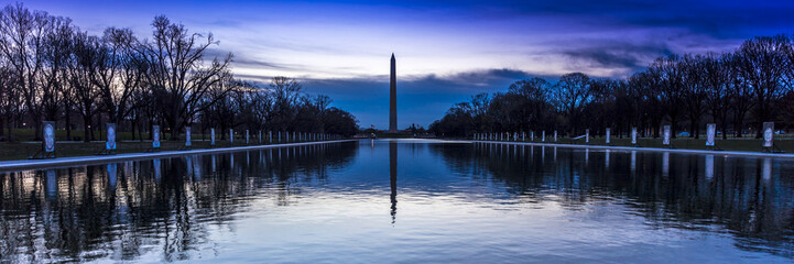 APRIL 8, 2018 - WASHINGTON D.C. - Washington Monument and reflecting pond at sunrise, Washington D.C.