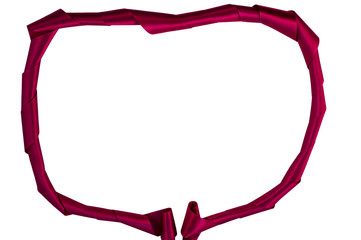 A satin ribbon of dark burgundy color, laid with a roll in the form of a frame on a white background.