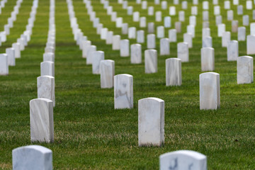 Hundreds of white grave markers at a national cemetary