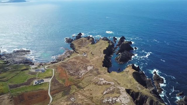 aerial footage of beautiful landscape with cliffs and ocean in northern point of Ireland, Malin Head  