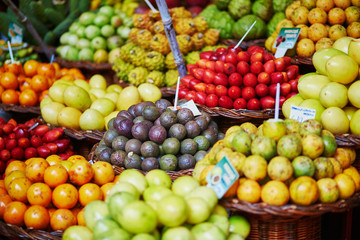 Naklejka na ściany i meble Exotic fruits on farmer market in Funchal, Madeira, Portugal