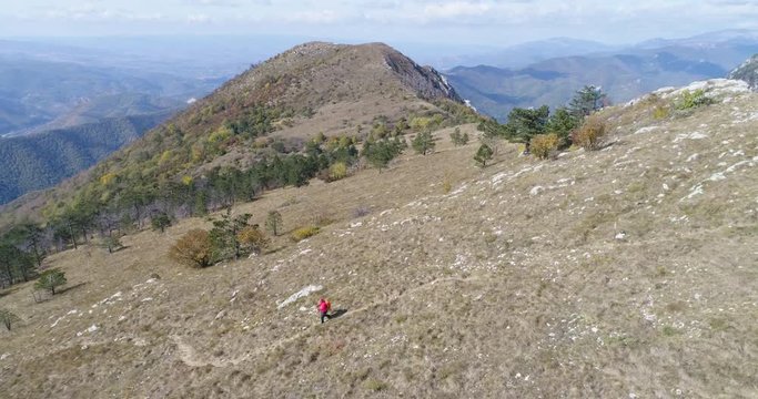 Aerial view of man hiking on the mountain - Domogled, Transylvania