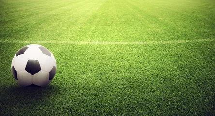 Cercles muraux Foot ballon sur le terrain de foot