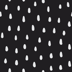 Hand drawn dots and spots seamless vector pattern. Abstract organic doodle shapes. Black and white simple brush texture. Strawberry-flavored decorative background design.