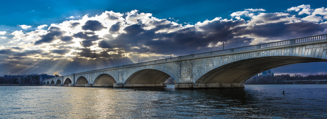 MARCH 25, 2018 - WASHINGTON D.C. - Memorial Bridge at dusk spans Potomac River at sunset