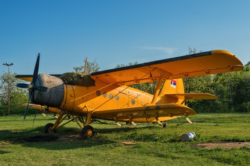 Old aircraft close up on grass