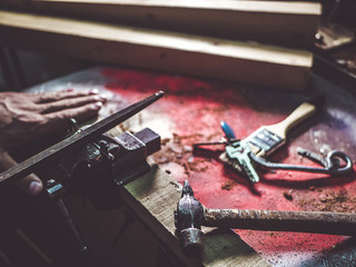 close up master crafting keys in the workshop