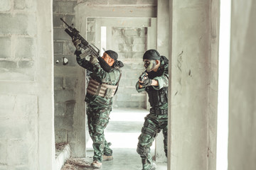 Special force soldiers in urban combat training.  Breach and entry building. Chinese soldiers in...