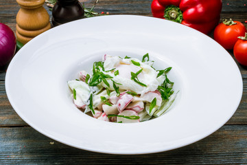 Vegetable salad with poached egg