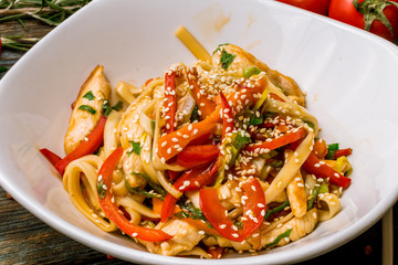Udon noodles with chicken and vegetables