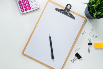 Top view of modern work space office desk table with computer , pen and copy space