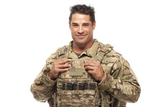 Smiling soldier against white background
