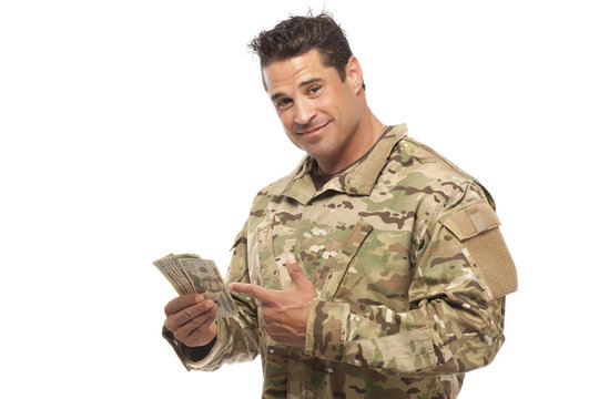 Soldier showing money