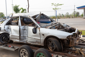 old car accident crash can't drive on car trailer