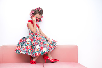 Young super model girl portrait. Pre teen girl dress up like a super model portrait. High heel red shoes, red sunglasses. Confident pose.