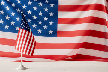 Fototapeta premium closeup view of united states of america flagpole and flag