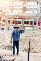 Obraz na płótnie Canvas Children working at construction site for world day against children labour concept: