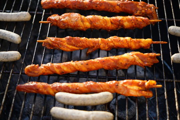Sausages barbecue with a charcoal barbecue in the garden

