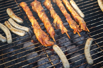 Sausages barbecue with a charcoal barbecue in the garden

