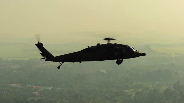 UH-60 Black Hawk Helicopter Flying in Midair