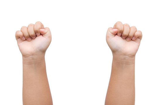 Children Boy hand showing fist as rock paper sign on white background