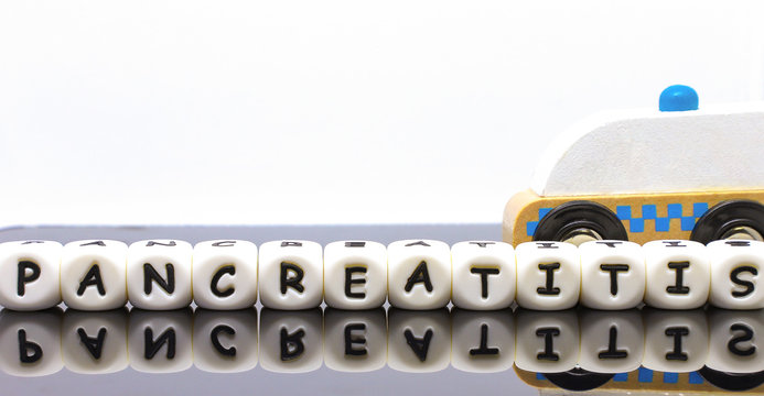 model car ambulance and alphabet letters