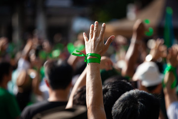 People raised hand air fighting for protest