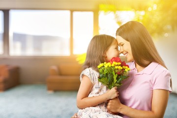 Happy Mother and daughter hugging