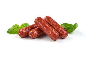 Salami smoked sausages with herbs isolated on white background