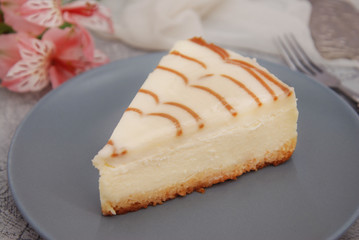 Cheese Cake with Caramel Sauce Isolated Caramel Sauce over Brown Paper with Spoon Sweet Sugar Dessert