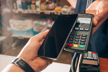 Demonstration of wireless payment via smartphone