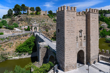 Fototapeta premium Alcantara Bridge, view from the defensive walls of Toledo