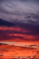 romantic sunset with clouds as background