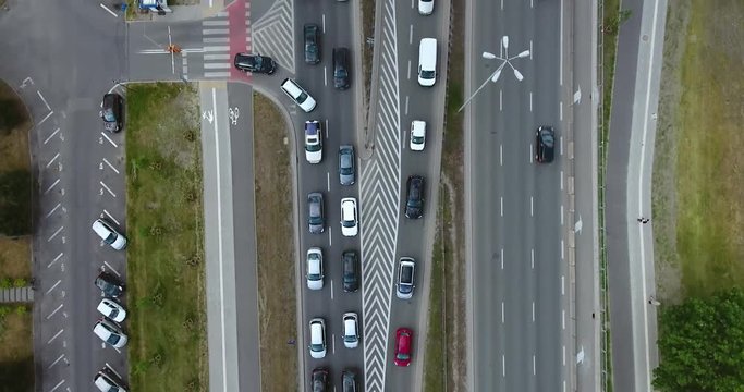 Aerial Shot. Cars Running On A Multi-Lane Road. Directly Above